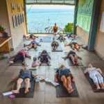 group in yoga pose at retreat